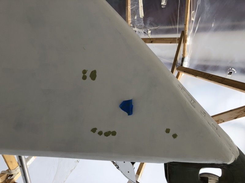 Pin holes filled with fairing compound